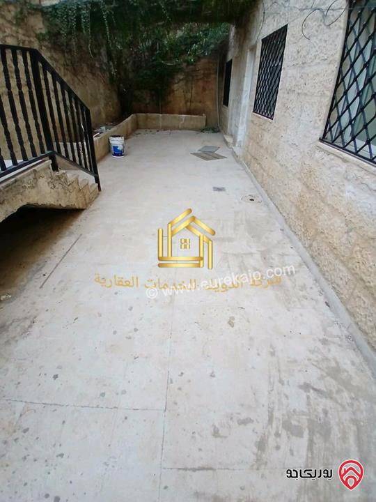 شقة فارغة طابق شبه ارضي مساحة 100م مع ترس 20م للإيجار في عمان - تلاع العلي 