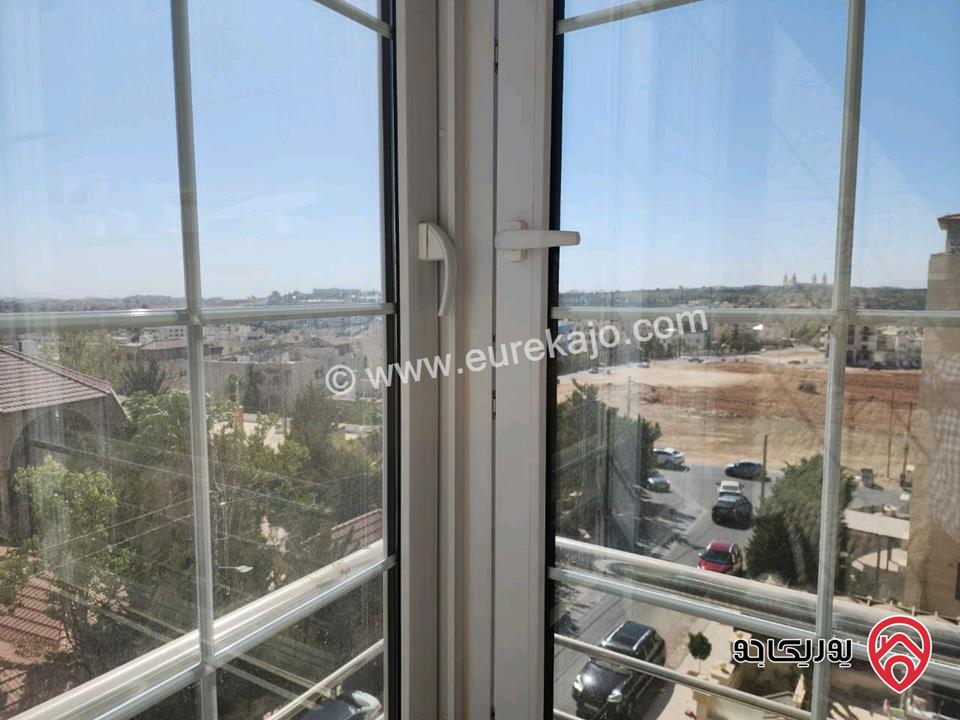 شقة طابقية مع روف المساحة الكلية 490م للبيع في عمان - خلدا مطلة على دابوق