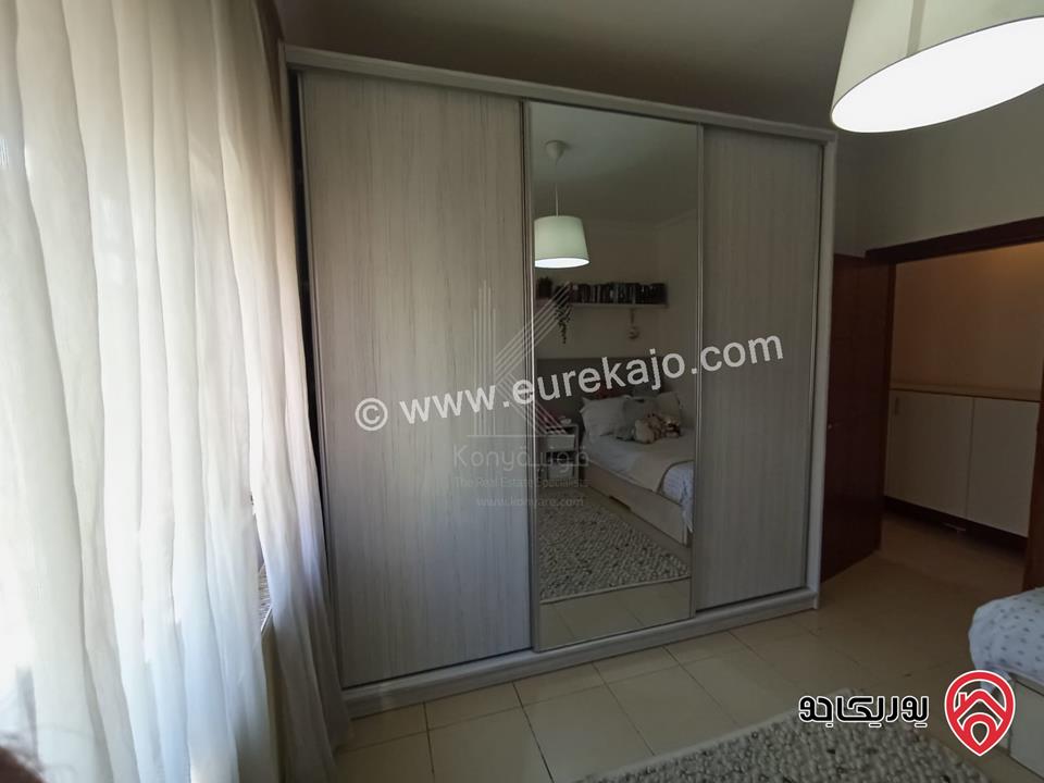 شقة فاخرة طابق أخير مع روف مساحة 211م للبيع في عمان - خلدا مع اطلالة مميزة