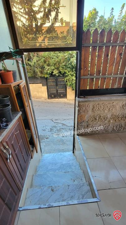 شقة أرضية مساحة 140م داخلي و 32م ترس للبيع في عمان - طبربور 