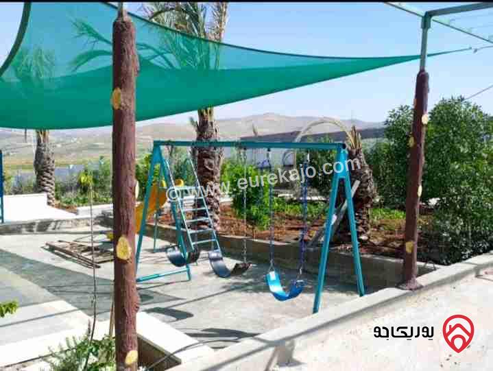 مزرعة مميزة مساحة الأرض 3400م ومساحة البناء 100م للبيع في عنيبة طريق جرش الزرقاء 
