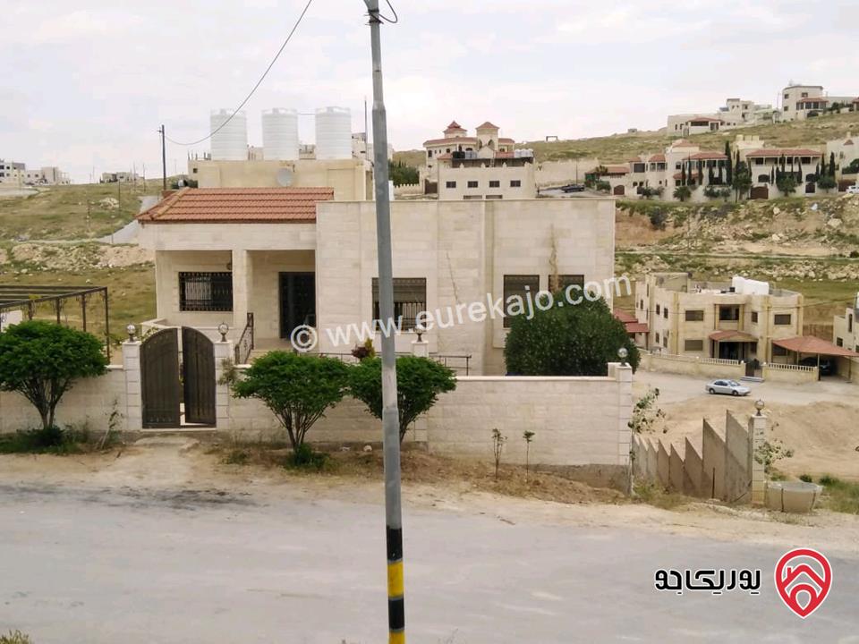 عماره مساحة 670م على أرض 755م للبيع في الزرقاء - ضاحية المدينة المنورة 