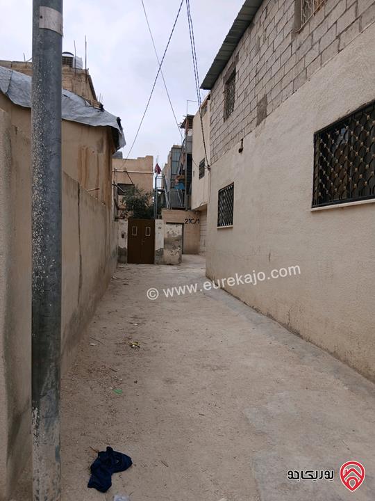 عمارة ثلاث شقق على أرض 443م للبيع في المفرق - حي الحسين