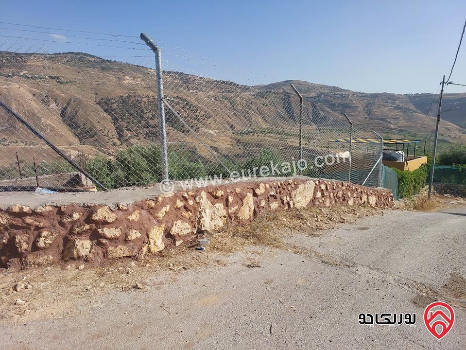 مزرعة مساحة 4 دونم للبيع في غرب عمان - البحاث 