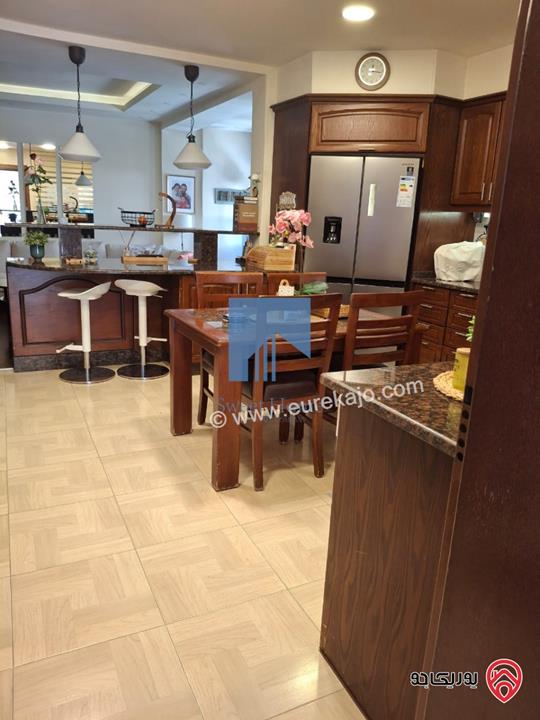 شقة أرضية فاخرة للبيع في عمان - ضاحية النخيل 186م مع ترس 70م بسعر مغري