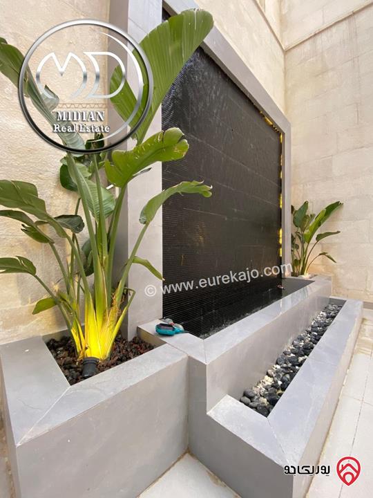 شقة شبه ارضي جديدة للبيع في عمان - جبل عمان مساحة 240م مع ترس و حديقة 200م تشطيبات ديكورات عصرية فاخرة بسعر مميز