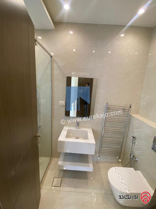 شقة أرضية فاخرة طابق ارضي معلق 90م تشطيب سوبر ديلوكس لم تسكن للبيع في عمان - أم أذينة