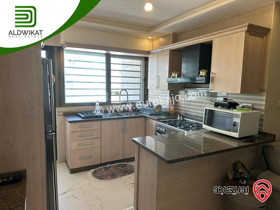 شقة شبه ارضي مفروشه للبيع في عمان - تلاع العلي المساحة الداخلية 81م والخارجية 33م موقع هادىء تشطيب حديث