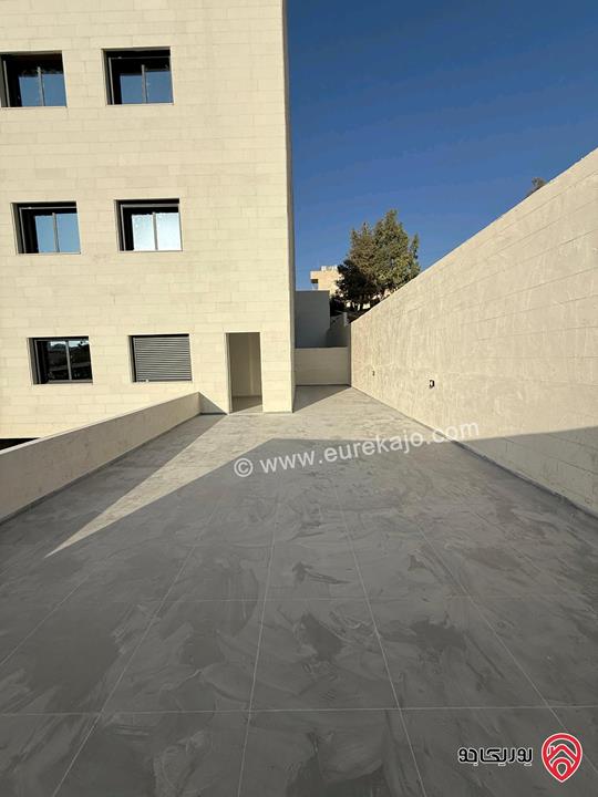 شقة أرضية ديلكوس مساحة 150م داخلي و 90م خارجي للبيع في عمان - الجبيهة الامام الغزالي