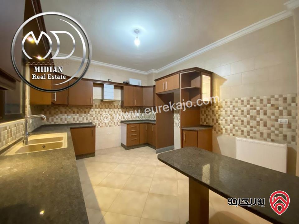 شقة شبه أرضي فارغة للايجار الرابية مساحة 170م مع ترس تشطيبات سوبر ديلوكس بسعر مميز