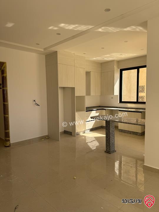 شقة سوبر ديلوكس طابق أرضي مساحة 100م داخلي و 50م خارجي للايجار في عمان - عبدون الشمالي 