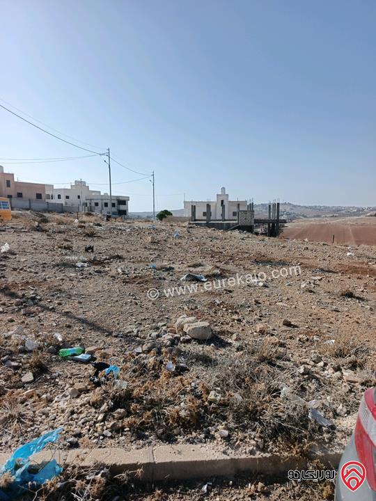 قطعتين أرض مساحتهم معاً 500م للبيع في مادبا - تطوير ماعين ع شارعين بسعر مناسب 35 الف