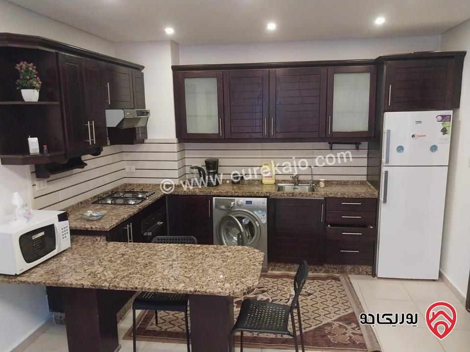 شقه للايجار في عمان - الدوار السابع مساحة 80م + 130م شبه ارضي قرب الترخيص