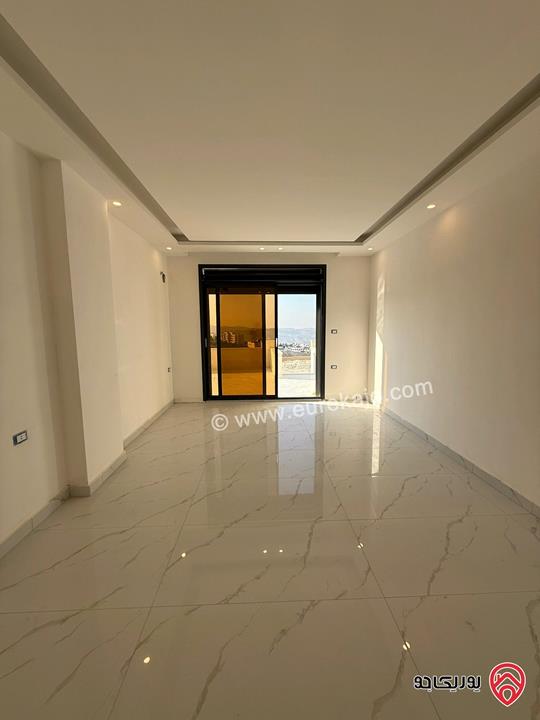 شقة أرضية ديلكوس مساحة 150م داخلي و 90م خارجي للبيع في عمان - الجبيهة الامام الغزالي