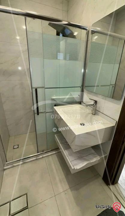 شقة شبه ارضية 90م مع ترس 120م ومدخل خاص فارغة للايجار في عمان - الجندويل