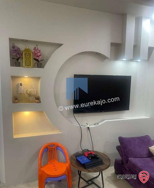 شقة مميزة شبه أرضية مساحة 130م للبيع في عمان - خلدا