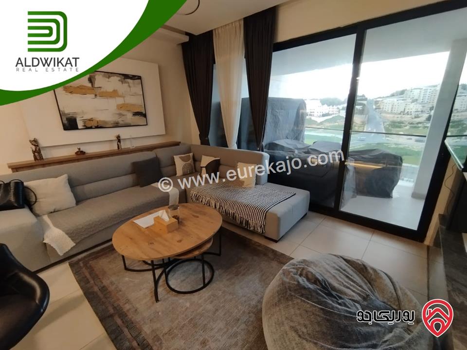شقة للبيع في عمان - خلدا طابق اول مساحة البناء 205م ومساحة الترس 30م