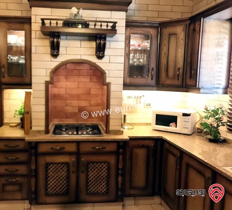 شقة مفروشة أرضية مساحة 360م مع حديقة 200م للايجار في عمان - الرابية