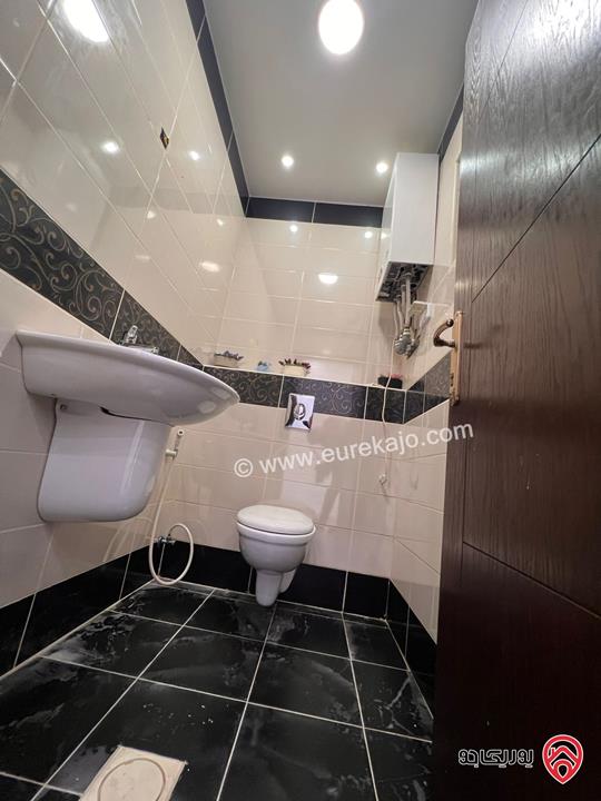 شقة شبه ارضية مساحة 110م للايجار في عمان - خلدا