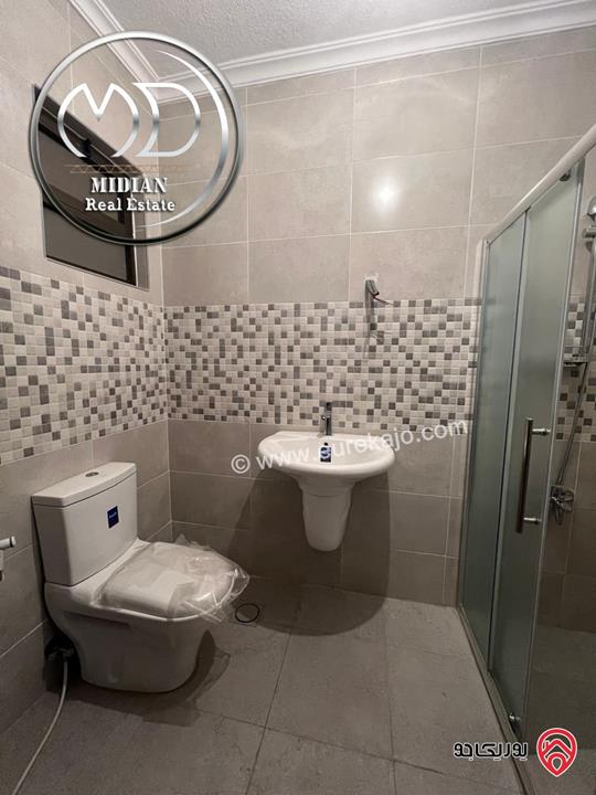 شقة ارضية جديدة فارغة للايجار في عمان - ضاحية الرشيد مساحة 150م مع ترس 50م تشطيبات سوبر ديلوكس بسعر مميز