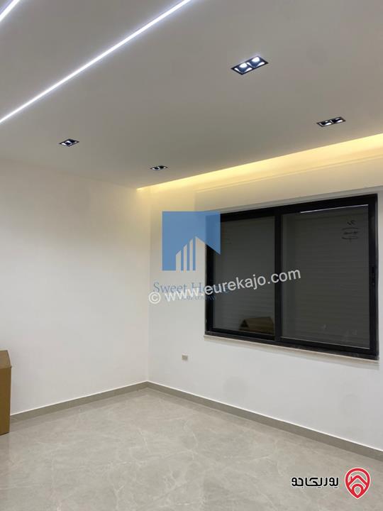 شقة أرضية فاخرة للبيع في عمان - أم أذينة قرب أبراج السادس 200م مع ترس 60م لم تسكن