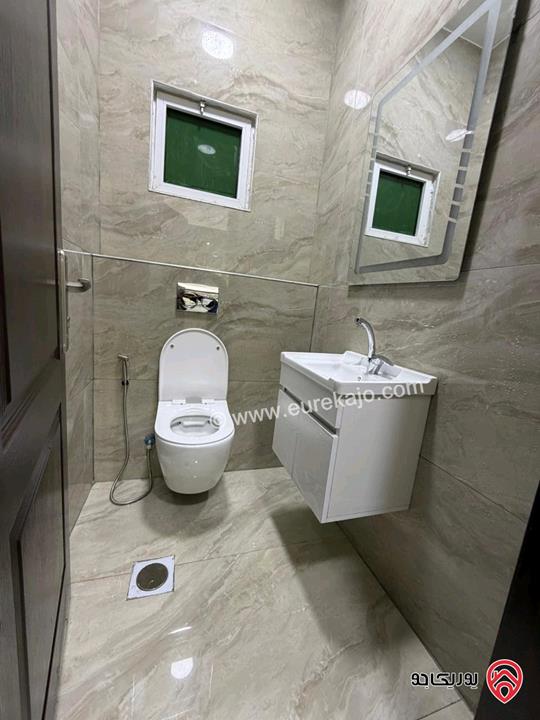 شقة طابق أرضي معلق مساحة 130م للبيع في عمان - ضاحية الرشيد