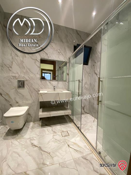 شقة شبه ارضي جديدة للبيع في عمان - جبل عمان مساحة 240م مع ترس و حديقة 200م تشطيبات ديكورات عصرية فاخرة بسعر مميز