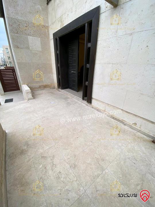 شقة جديدة لم تسكن طابق ارضي مساحة 200م مع ترس 40م للإيجار في عمان - خلدا 