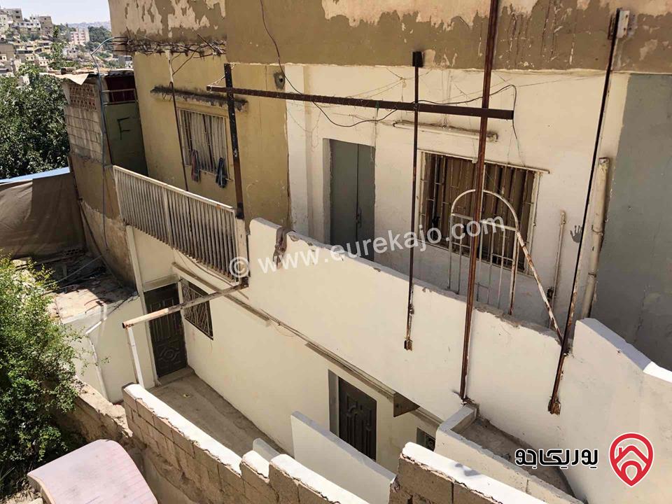 بيت طابقين على ارض 107م للبيع في وسط عمان مثلث جبل القلعة السياحي