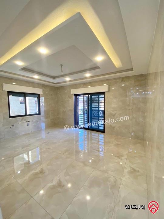 شقة ارضية مساحة 145م داخلي و 25م خارجي للبيع في عمان - ابو علندا اسكان الكهربا 