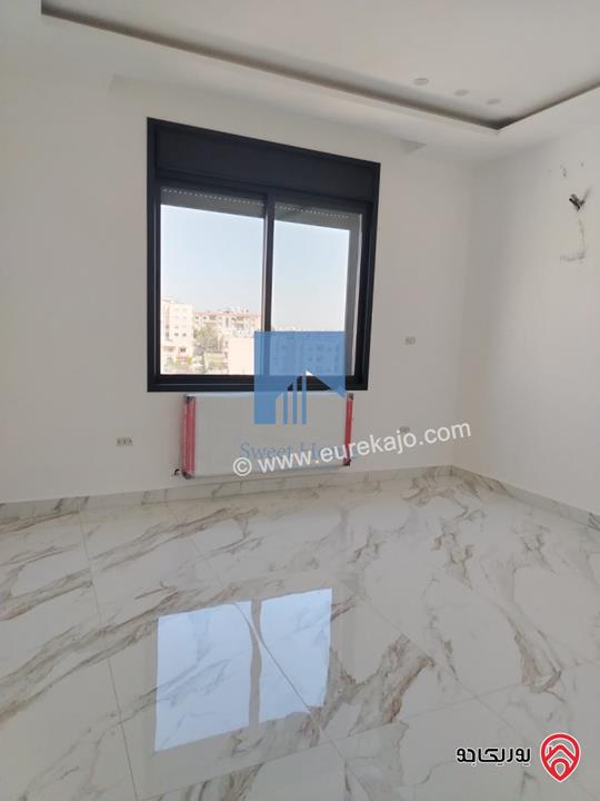 شقة فاخرة للبيع في عمان - خلدا خلف المستشفى السعودي ومقابل ميداس طابق ثالث 180م مع روف دوبلكس 130م لم تسكن