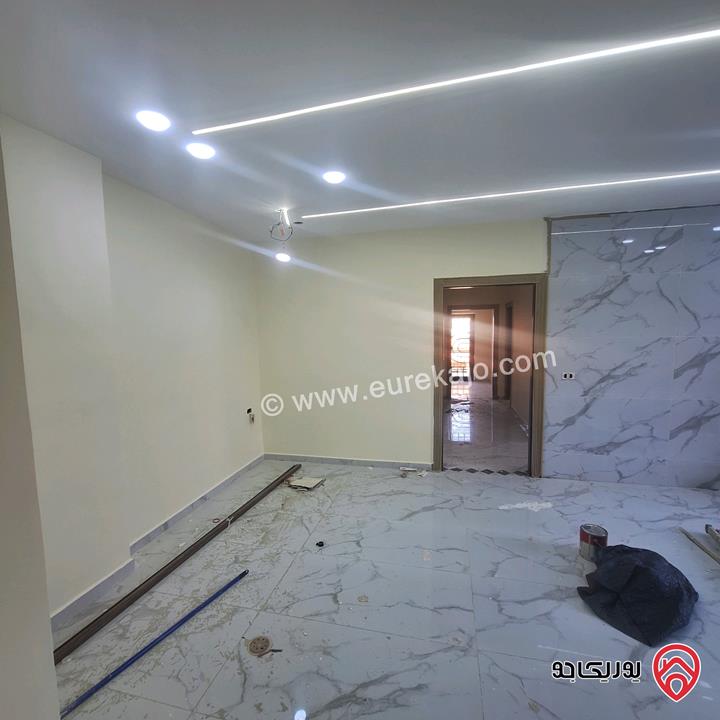 شقق مساحات 125م / 135م / 138م للبيع اقساط بدون بنوك او شركات تمويل في اربد شارع القدس