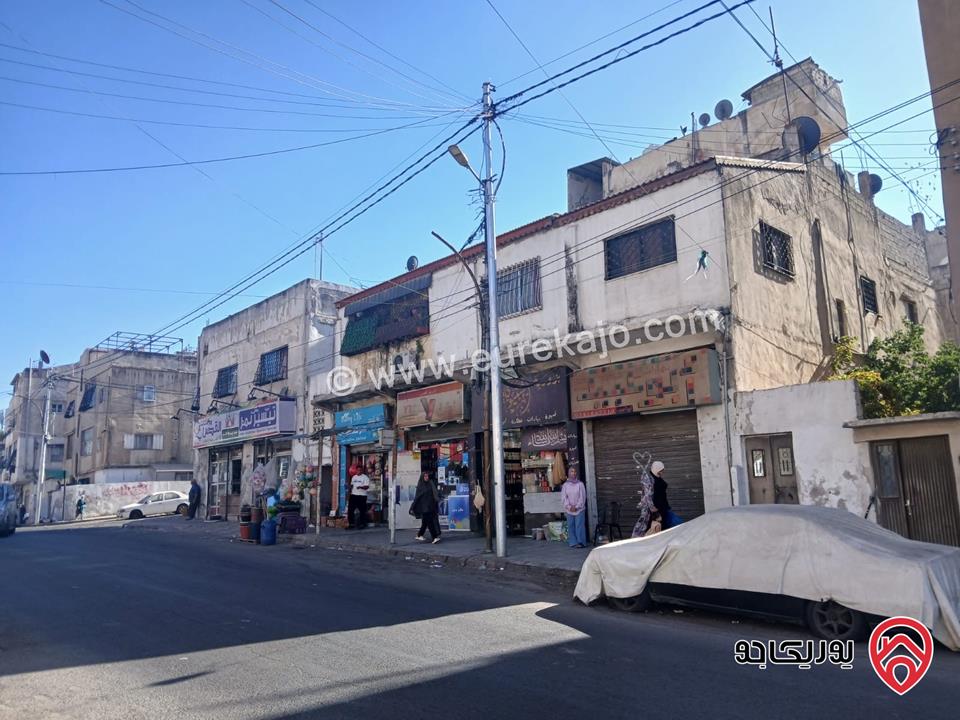 مجمع تجاري 6 ابواب تجارية و 5 شقق سكنية على أرض 531م للبيع في عمان - حي نزال