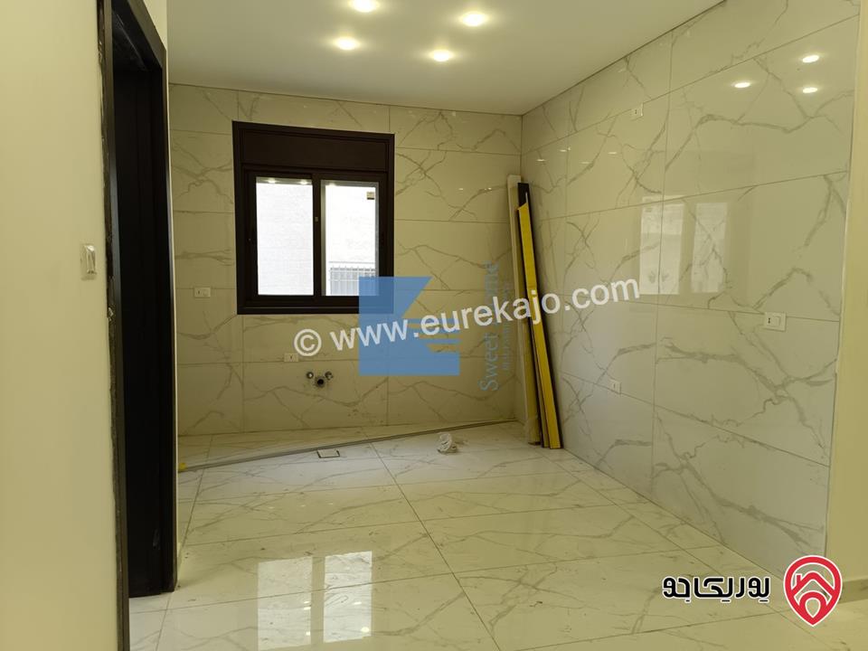 شقة فاخرة للبيع في عمان - الجندويل - قرب لارسا ومقابل شركة زين طابق اول 115م تشطيب سوبر ديلوكس لم تسكن