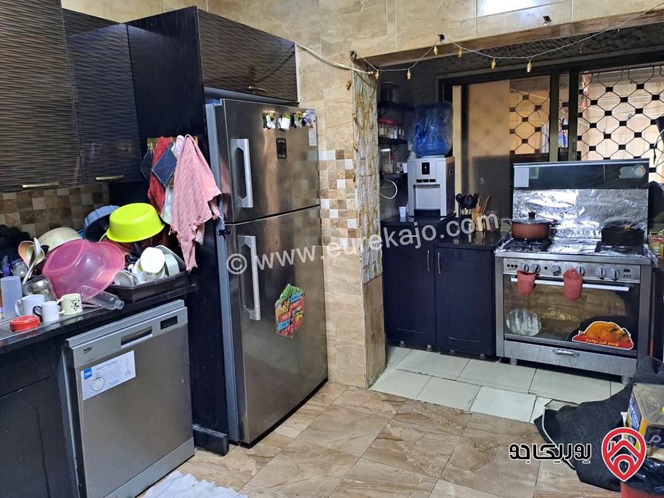 شقة طابق شبه ارضي مساحة 143م داخلي و 50م خارجي للبيع في عمان - أم نوارة