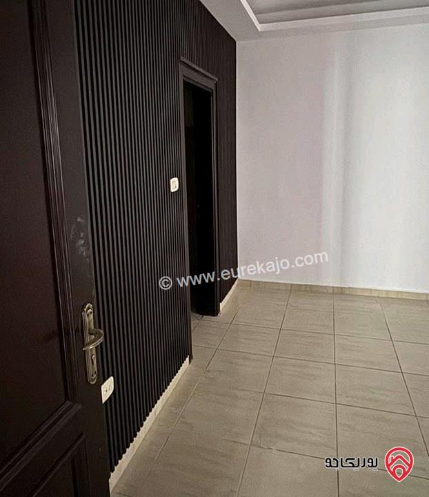 شقة مساحة 180م طابق أرضي معلق للايجار في عمان - خلدا