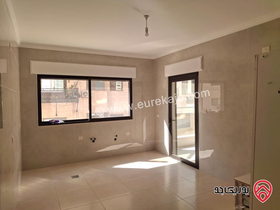 شقة جديدة طابق أول مساحة 180م للبيع في عمان - دير غبار