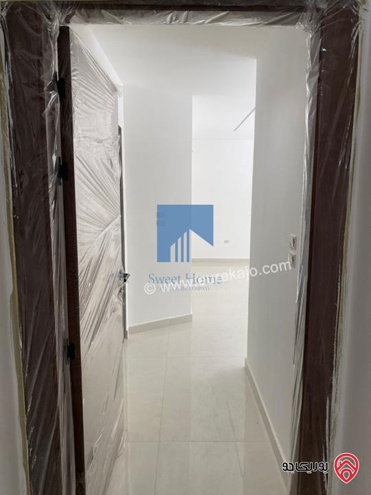 شقة فاخرة للبيع في عمان - أم أذينة قرب أبراج السادس 200م مع حديقة وترسات 250م لم تسكن