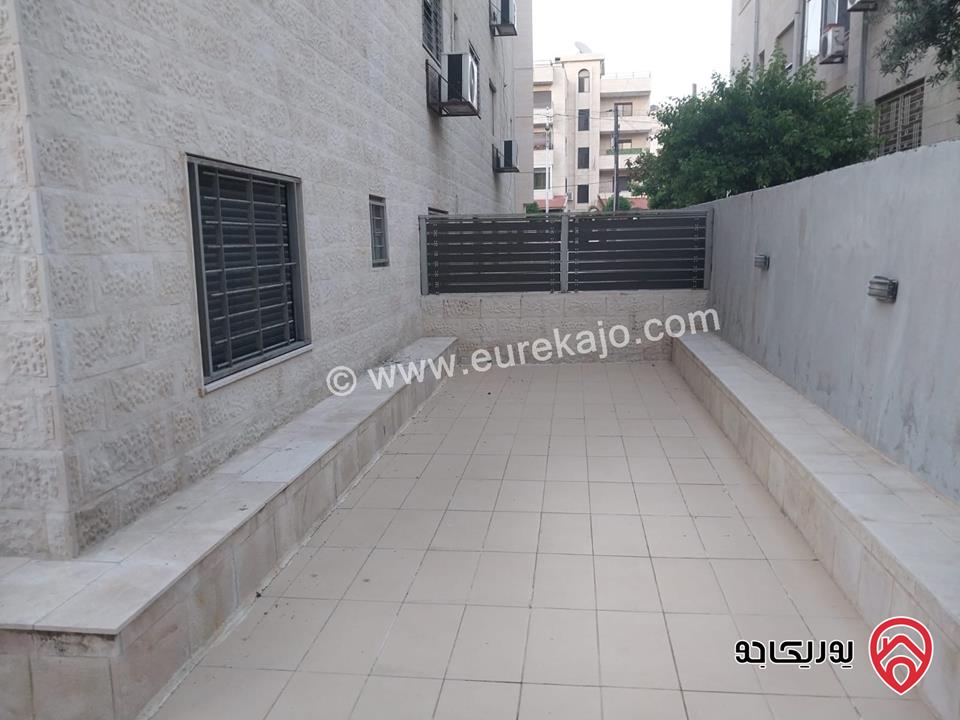 شقه للايجار في عمان - الدوار السابع مساحة 80م + 130م شبه ارضي قرب الترخيص