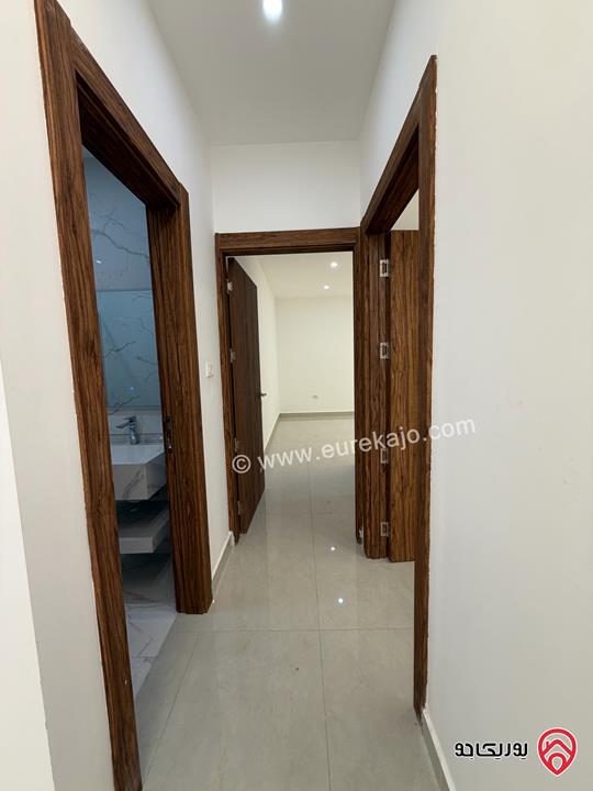 شقة طابق أول مساحة 90 متر داخلي وترس 60 متر للبيع في عمان - ضاحية الياسمين