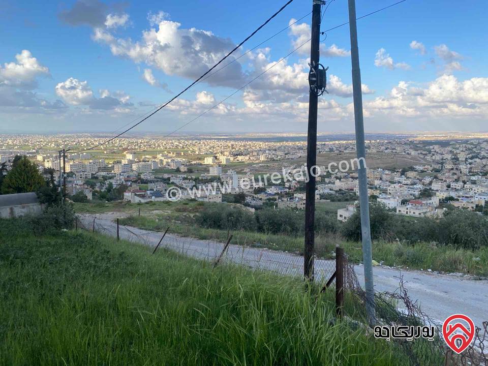 فرصتك الذهبية لبناء بيت العمر او اسكان – أرض سكنية مرتفعة بإطلالة ساحرة مساحة 1 دونم و 79م للبيع في اربد - الحصن / حوض الأصبح