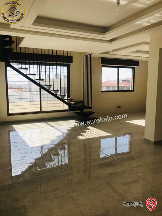 شقة فاخرة للبيع في عمان - خلدا - العوجانية قرب الهمشري طابق ثالث 200م مع روف دوبلكس 140م لم تسكن