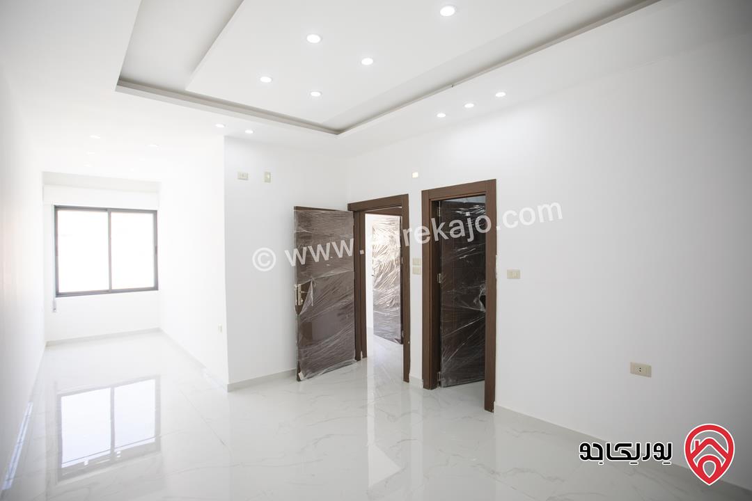 شقة فاخرة طابق ثالث مع روف مساحة 170م مع ترس 100م للبيع في عمان - ابو علندا بسعر مغري جدا مع امكانية التقسيط من المالك