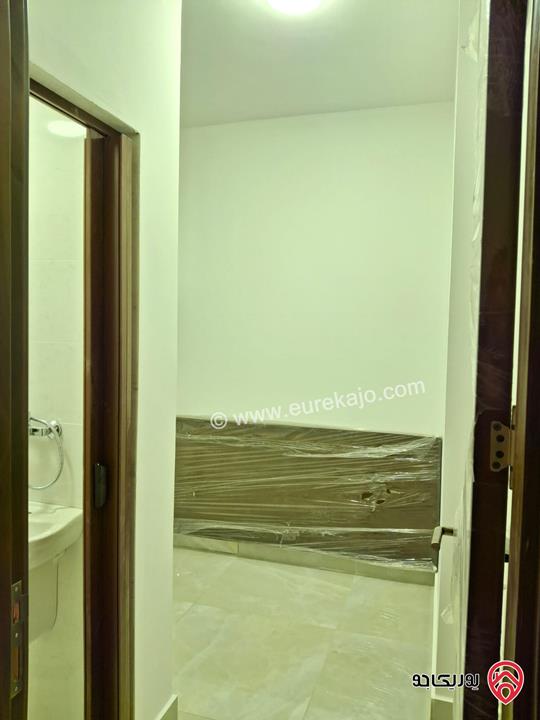 شقة جديدة طابق أول مساحة 180م للبيع في عمان - دير غبار