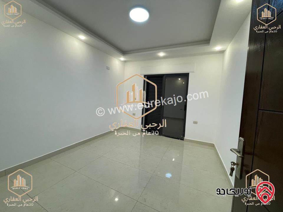 شقة ارضية جديدة مساحة 150م داخلي و 50م خارجي للايجار في عمان - الجندويل 