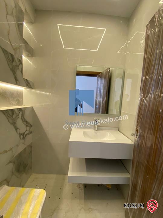 شقة فاخرة للبيع في عمان خلدا - قرب إشارة البنك العربي طابق ثالث 175م مع روف دوبلكس 120م لم تسكن