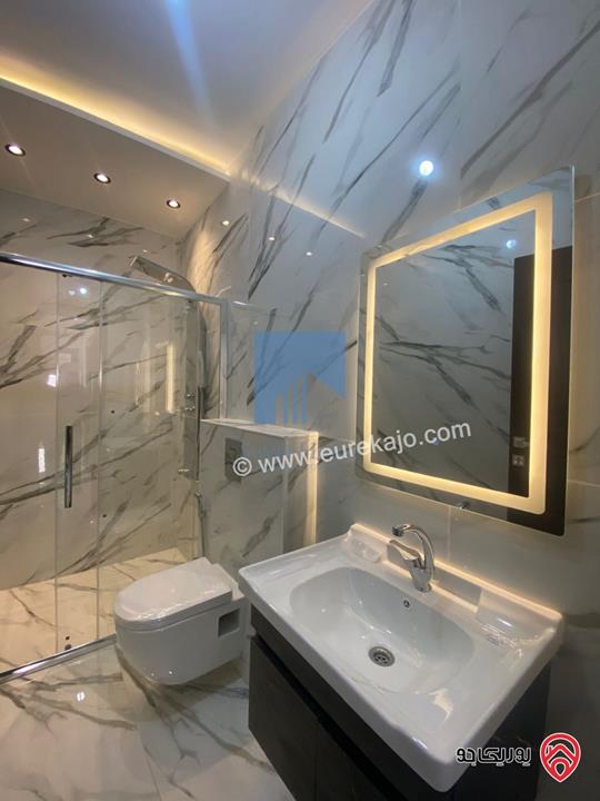 شقة فاخرة شبه أرضية مساحة 160م مع ترس 25م تشطيب سوبر ديلوكس للبيع في عمان - تلاع العلي