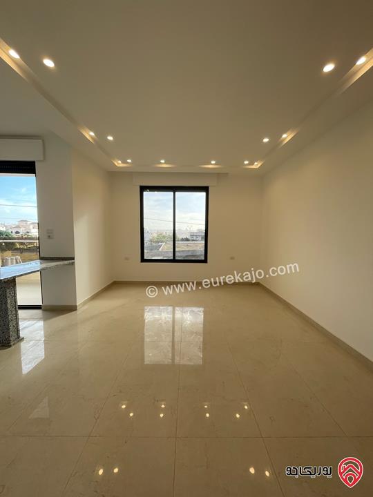 شقة طابق اول جديدة مساحة 100م لم تسكن للايجار في عمان - عبدون