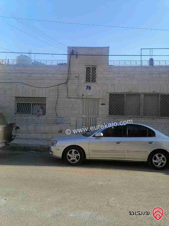 شقة على مستوى الشارع مساحة 110م للبيع في عمان - جبل التاج حي ام تينة