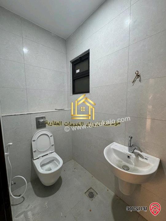 شقة جديدة لم تسكن طابق ارضي مساحة 125م للإيجار في عمان - مرج الحمام 